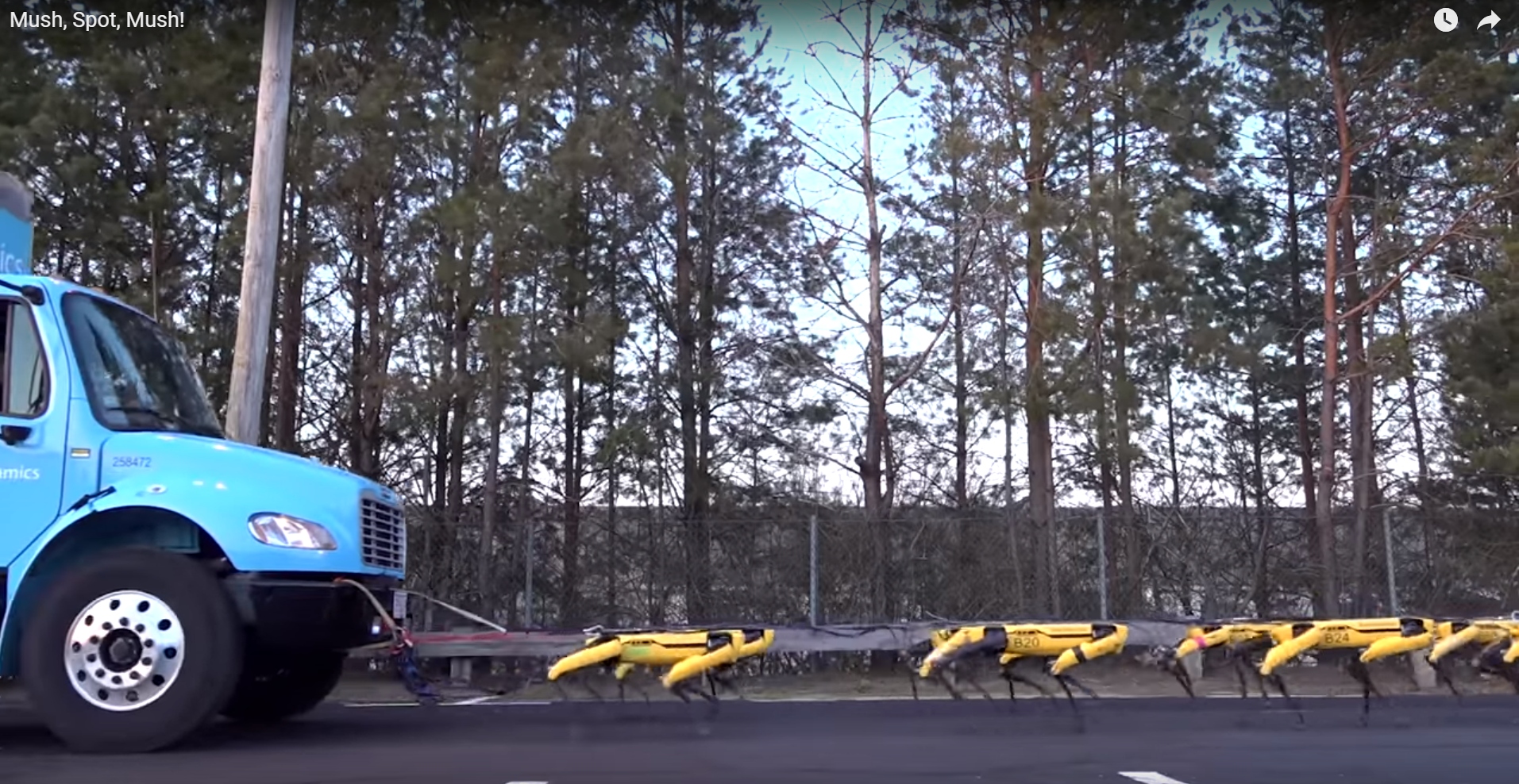 Boston Dynamics показала, как 10 роботов Spot буксируют грузовик